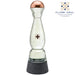 A clear glass tequila decanter with a copper-colored top, a small black floral emblem on the front, and a textured dark gray base. The Clase Azul logo is visible in the upper right corner against a plain white background.