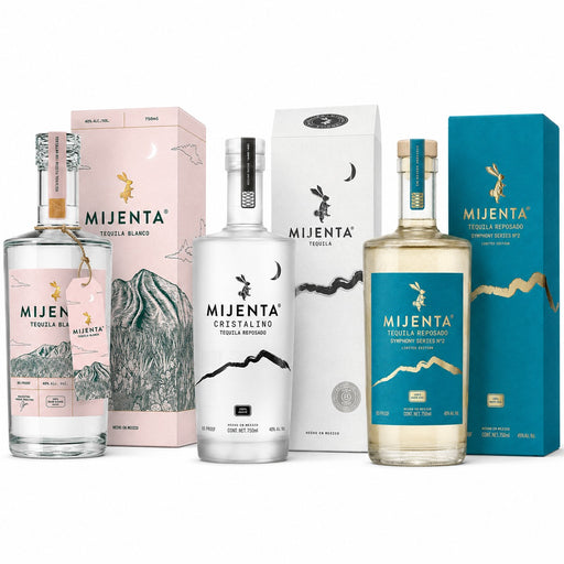 A collection of three Mijenta tequila bottles and their corresponding retail boxes, arranged neatly against a solid white background. The lineup includes Tequila Blanco with a pink label and box, Tequila Reposado with a turquoise label and box, Tequila Cristalino with a white label and box, and Tequila Añejo with a white label and box.
