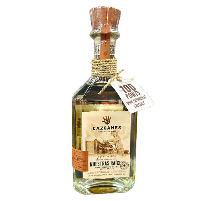 Bottle of Gazcanes tequila with a tag on a white background