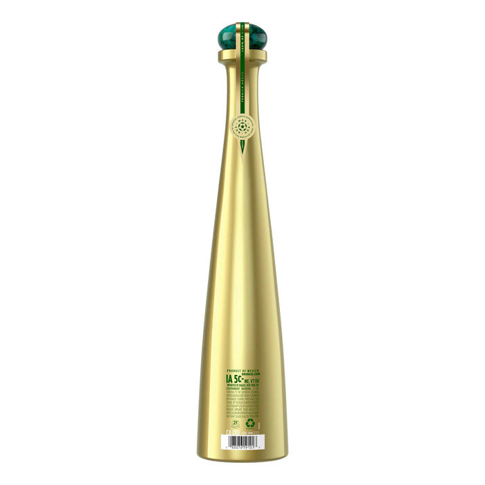 Gold bottle with green cap on a white background
