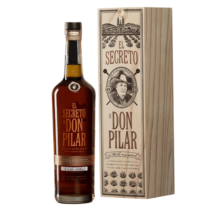 Bottle of 'El Secreto Don Pilar' with its packaging on a white background