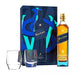 Johnnie Walker Blue Label whisky set with bottle, packaging, and glasses on a white background