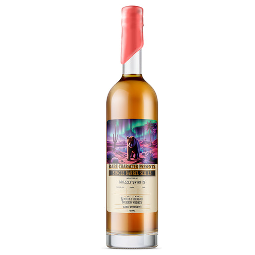 Bottle of whiskey with a colorful label featuring a bear, on a white background