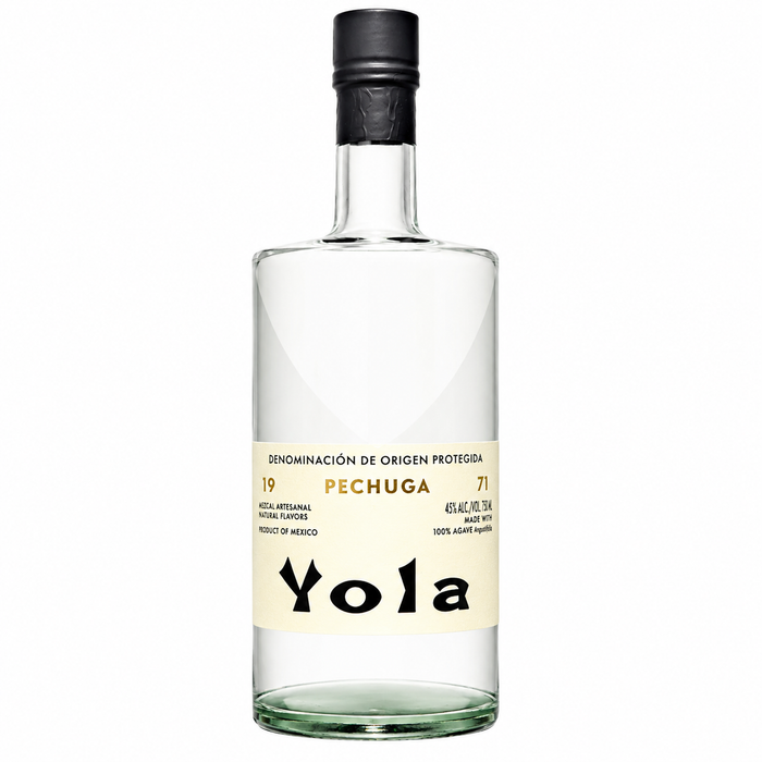 A bottle of Yola Pechuga agave spirit, featuring a clear glass bottle with a cream-colored label and a black cap, set against a plain white background.